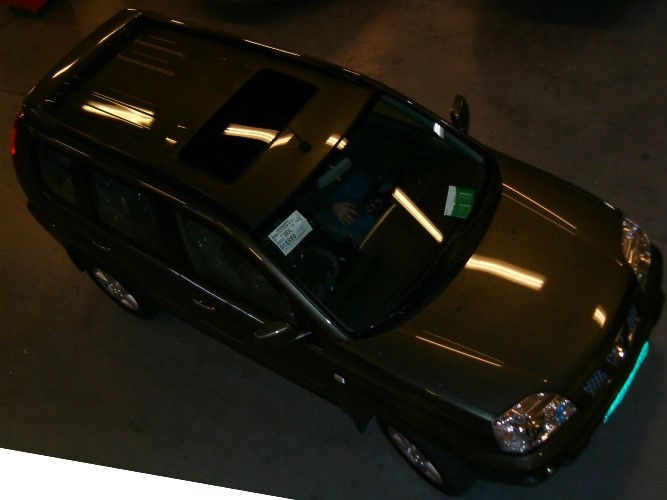 afbeelding 3: een ingebouwd schuifdak of vouwdak in een Nissan X-Trail 